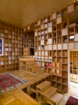 Illustration for article titled A House Made from Bookshelves Is So Much Better Than a House Made from E-Books